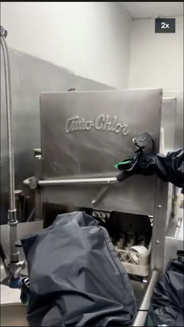 Robot arm pulling the dishwasher door down